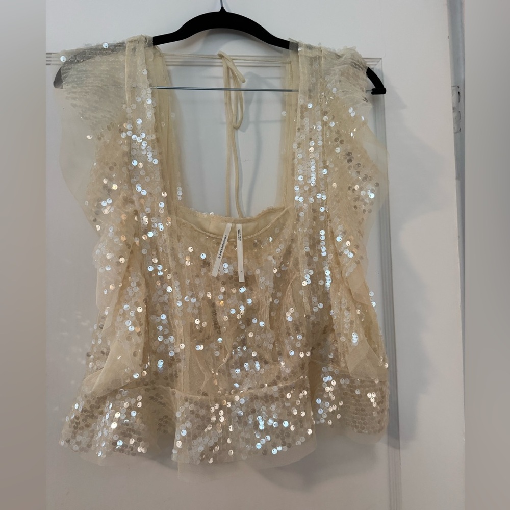Shimmery gold sequin top from Anthropologie